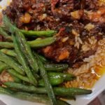 Okay tonight for dinner we have-Oxtails w Sauce-gravy ova white rice 🍚 Sautéed String beans A M