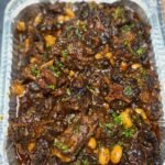 Oxtail Oven jerk chicken Escovitch fish Festival Rice and peas Toss sald Served for a group of 1 (1)