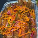 Oxtail Oven jerk chicken Escovitch fish Festival Rice and peas Toss sald Served for a group of 1